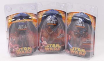 A collection of three Star Wars Hasbro Revenge of the Sith Lava Reflection action figures, to
