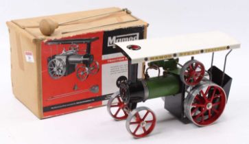 A Mamod live steam spirit fired TE1 traction engine comprising green and red body with original