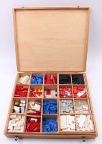 Lego 1970s/80s wooden storage box containing a collection of various Lego components, with a