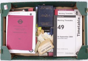 A tray of hardback and softback railway and transport related ephemera to include luggage labels,