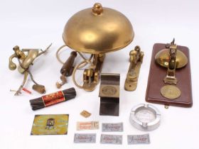 One box containing a quantity of various brass tram gongs, rail shims, ashtrays and various track