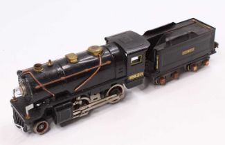 Lionel electric loco, 2-4-0 with bogie tender, black, no.257 on cab-sides, some small corrosion