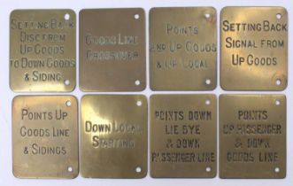 A collection of eight mixed region brass signal box lever plates, some double sided, others single