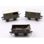 Three Bassett-Lowke pre-WWII GW goods wagons: open with tarpaulin; goods van and goods brake van.