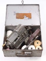 A tin cased bus or tram conductor's ticket machine by TIM housed in the original box