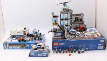 A collection of Lego City Police-themed construction kits, including No. 60141 large scale Police