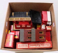 A large box containing mainly Triang/Hornby lineside accessories, buildings etc. Much is boxed but