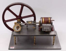 A very well engineered scratch built horizontal stationary steam engine comprising of large single