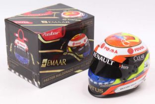 A KC Sports International Lotus F1 Team Racing Helmet of Pastor Maldonardo in its original box