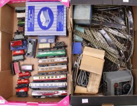 Two large trays containing Hornby controllers (not tested), coaches & wagons. All suitable for