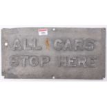 A cast aluminium rectangular tram stop sign, ex-Glasgow, reads "All Cars Stop Here", complete with