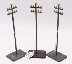 Three Hornby Telegraph poles. Two 1928-9 grey blue tinplate base & post, two crossbars at 7/8”