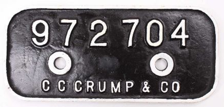 A CC Crump & Co railway wagon plate numbered 972704 later overpainted white on black example