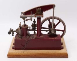 A Stuart Turner live steam stationary beam engine comprising of hand painted maroon body with