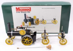 A Mamod live steam TWKI tractor and wagon kit, built example, housed in the original box with rubber
