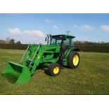 John Deere 5070M tractor with loader. Comes with bucket and tines. Low hours (1,609 hours) (Year /