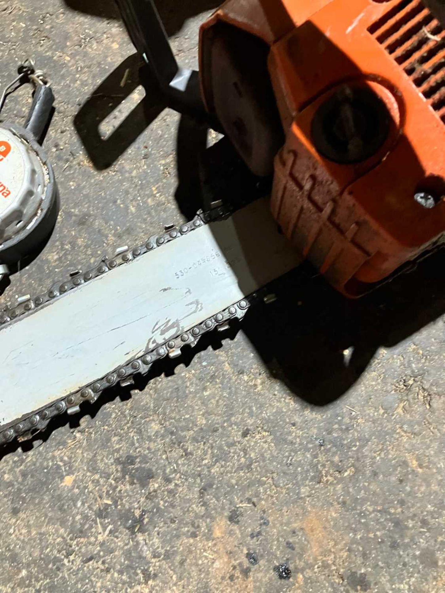 Husqvarna 36 Chainsaw plus tape, braces, mallet, gloves and log pick up tool (Located in Brandon) ( - Bild 8 aus 10