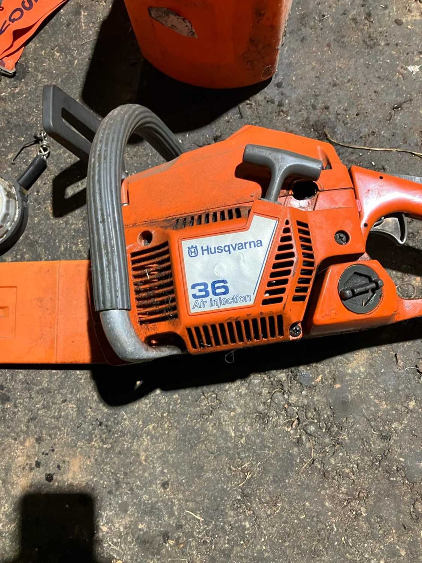 Husqvarna 36 Chainsaw plus tape, braces, mallet, gloves and log pick up tool (Located in Brandon) ( - Bild 9 aus 10