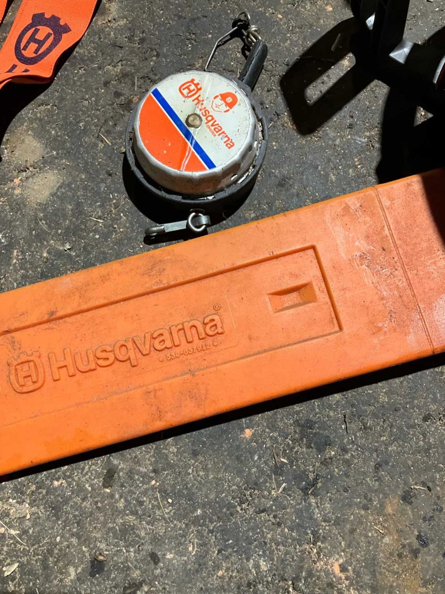 Husqvarna 36 Chainsaw plus tape, braces, mallet, gloves and log pick up tool (Located in Brandon) ( - Bild 7 aus 10