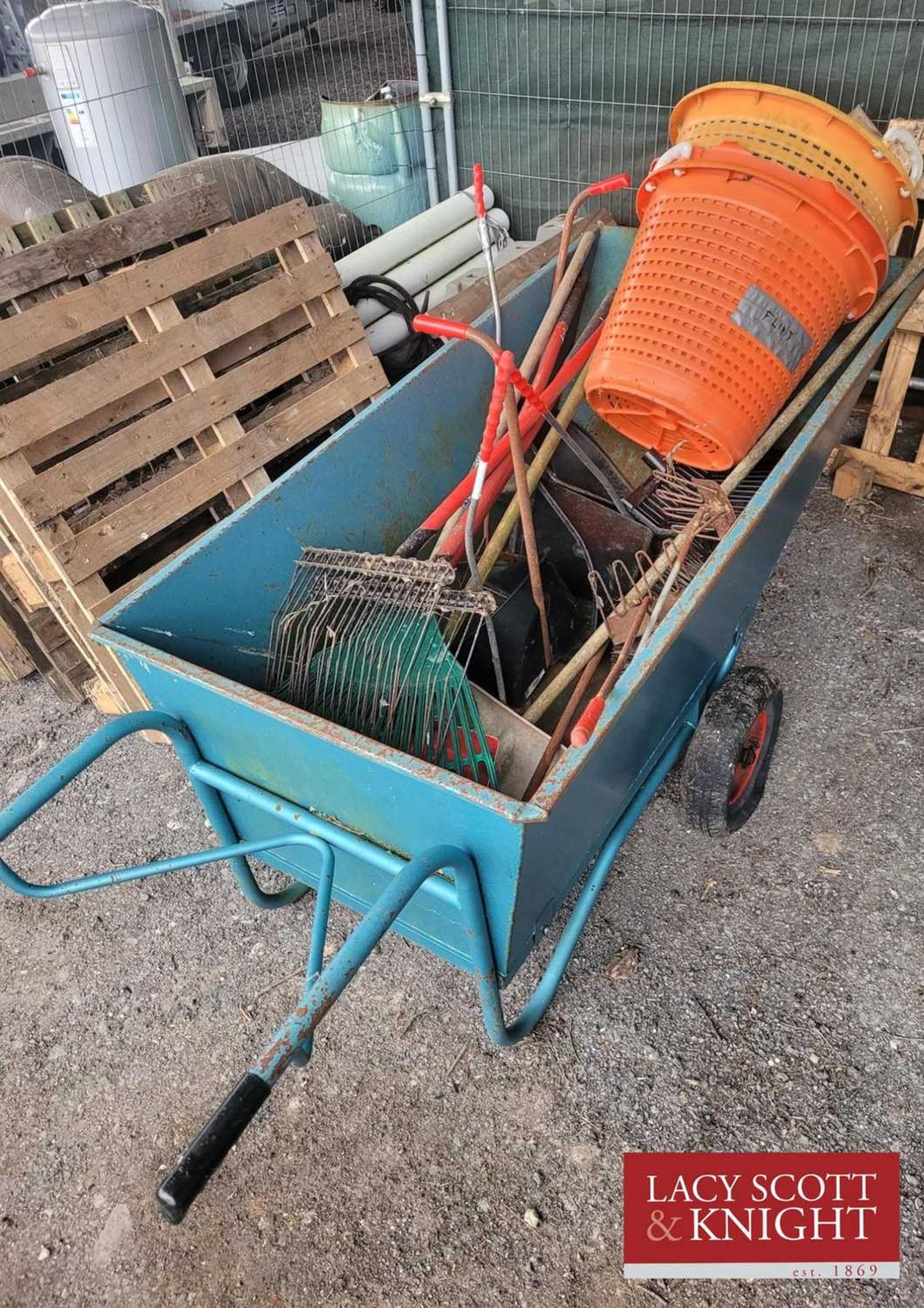 Large muck out barrow with selection of hand tools. (Located in Euston, Thetford) (VAT)