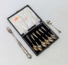 A set of six Elizabeth II silver coffee spoons; together with an enamelled silver coffee spoon;