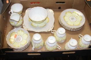 A Tuscan pottery floral tea service A little crazed but appears intact.