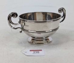 An Edwardian silver sugar bowl, of circular twin handled form, Charles Stewart Harris, London