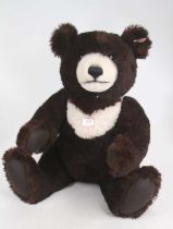 A large Steiff teddy bear, having opposable limbs, seated h.49cm