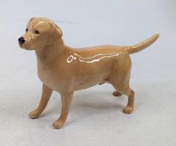 A Beswick Pottery figure of a yellow labrador, height 14cm