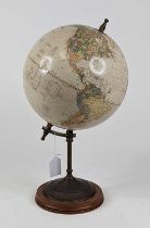 *A reproduction terrestrial table globe, on brass support, and further circular wooden base,