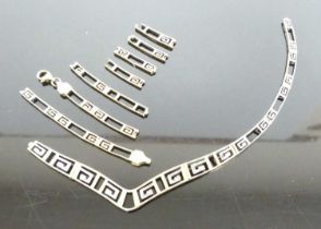 A modern 9ct gold Greek key necklace (broken in several places and sold as scrap), 8.9g