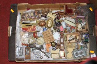 A collection of vintage dolls house furniture and miniatures