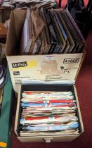A collection of 12" vinyl records, to include Nat King Cole - Come closer to me, and Whitney Houston