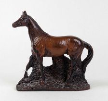 A Priory Castings painted resin figure of a horse, modelled standing on a naturalistic base,