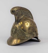 A 19th century brass fireman's helmet, height 25cm