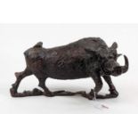 A carved oak model of a boar, shown in standing pose, length 39cm