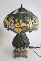 A Tiffany style coloured glass table lamp, decorated with dragonflies, height 54cm Excellent