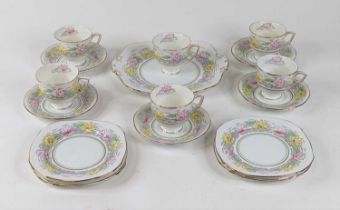 A Royal Stafford Lotus pattern part tea service, comprising six cups, five saucers, six side plates,