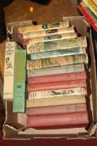 A collection of vintage children's books, primarily Enid Blyton