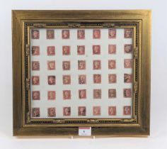 A display of forty-two Victorian Penny Reds, various postmarks, within a gilt frame, 31x34cm