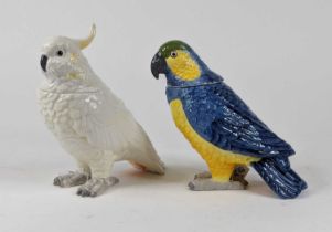 A pair of novelty jars and covers, each in the form of a parrot, height 23cm In good condition.