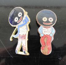 Two enamelled metal 'Golly' pin badges, each 3.5cm