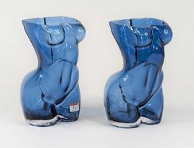 A pair of blue glass vases each in the form of a female torso, height 27cm