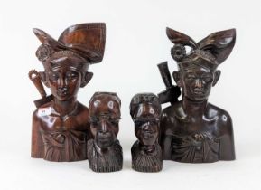 *A pair of Indonesian carved hardwood head & shoulders busts of warriors, height 33cm together