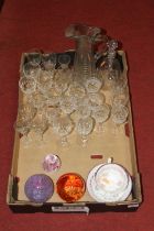 A collection of glassware and ceramics, to include coloured glass paperweights, Victorian tea cup