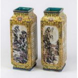 A pair of Chinese export vases of cong shape, each decorated with landscape within cartouche on a
