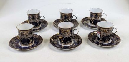 A set of six early 20th century Copeland Spode coffee cans and saucers each having gilt decoration