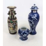 A Chinese porcelain vase and cover of baluster shape, underglaze decorated in the blue & white