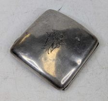 A George V silver pocket cigarette case, of curved hinged rectangular form, having engraved monogram