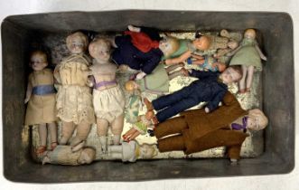 A collection of miniature bisque headed and celluloid dolls, largest height 10cm